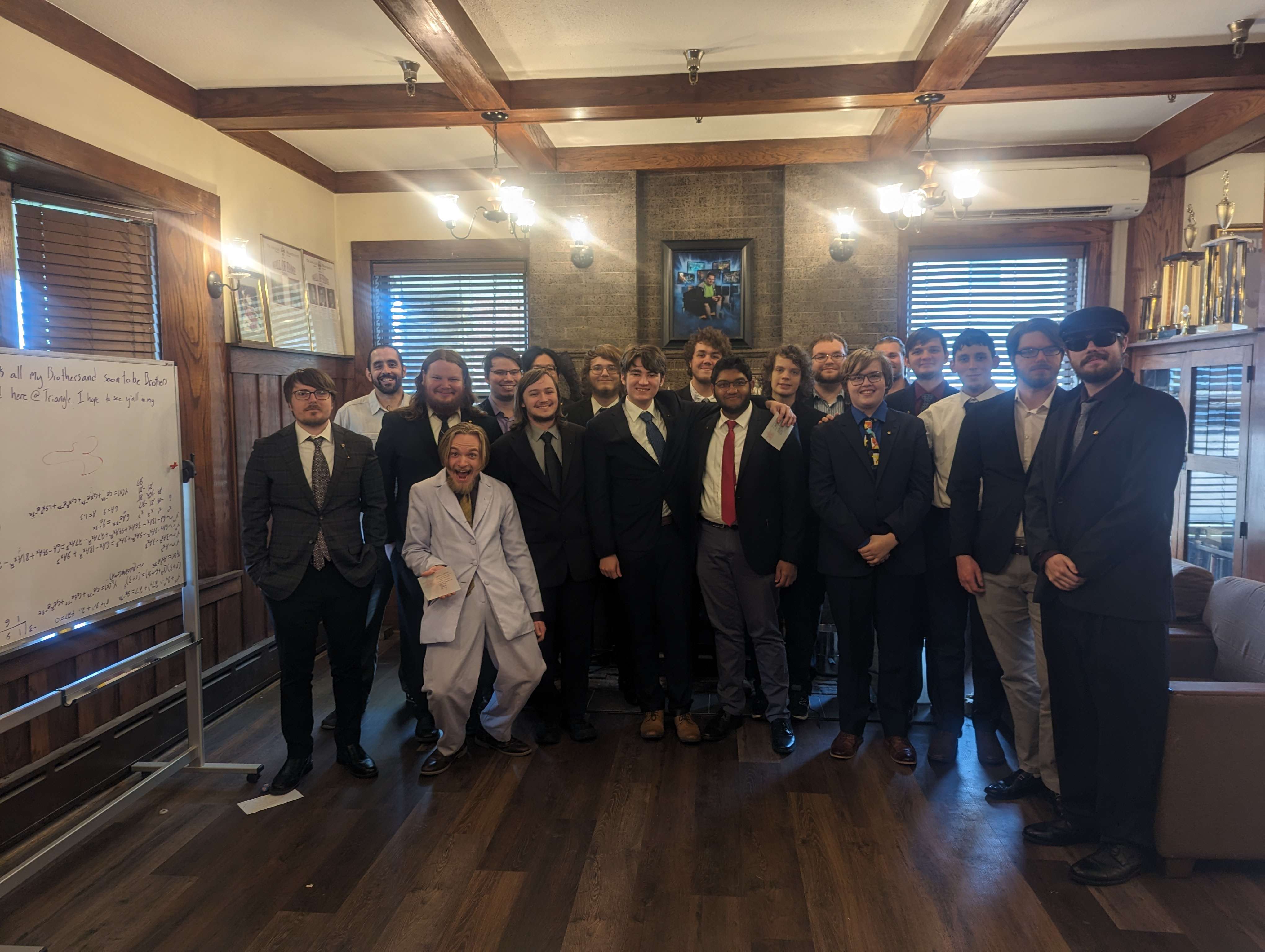 Members of Triangle Fraternity in their chapter house in 2024